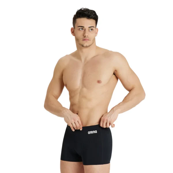 Arena malla Team solid short hombre